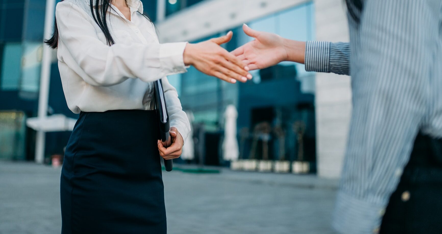 Business woman, handshake with partner outdoor